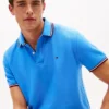 Polo Tommy Wicking de corte regular Polo Tommy Wicking de corte regular