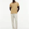 Polo Tommy Wicking de corte regular Polo Tommy Wicking de corte regular
