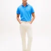 Polo Tommy Wicking de corte regular Polo Tommy Wicking de corte regular