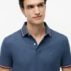 Polo Tommy Wicking de corte regular Polo Tommy Wicking de corte regular