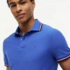 Polo Tommy Wicking de corte regular Polo Tommy Wicking de corte regular