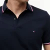 Polo Tommy Wicking de corte regular Polo Tommy Wicking de corte regular
