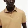 Polo Tommy Wicking de corte regular Polo Tommy Wicking de corte regular