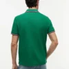 Polo Tommy Wicking de corte regular Polo Tommy Wicking de corte regular