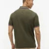 Polo Tommy Wicking de corte regular Polo Tommy Wicking de corte regular