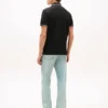 Polo Tommy Wicking de corte regular Polo Tommy Wicking de corte regular
