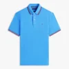 Polo Tommy Wicking de corte regular Polo Tommy Wicking de corte regular
