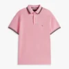 Polo Tommy Wicking de corte regular Polo Tommy Wicking de corte regular