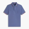 Polo Tommy Wicking de corte regular Polo Tommy Wicking de corte regular