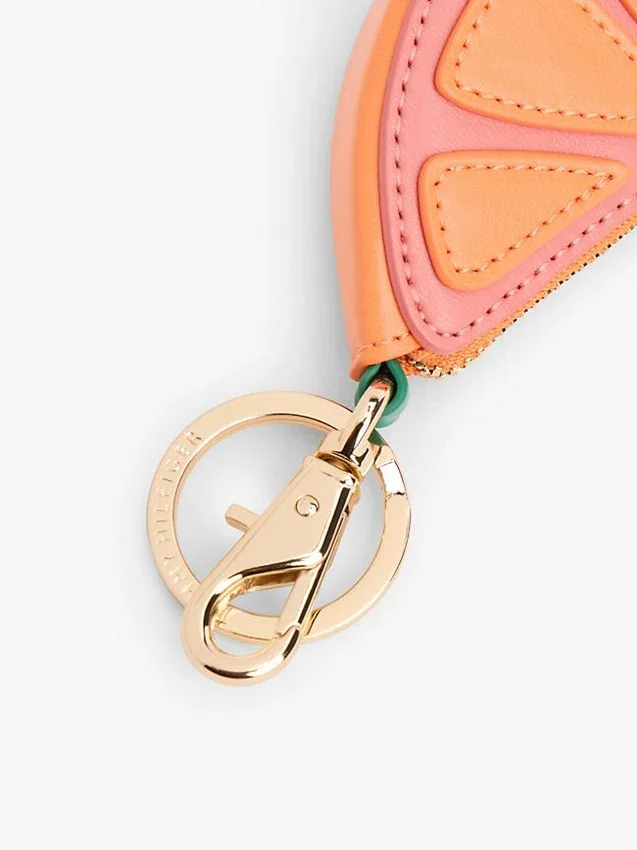 Porta-moedas em cunha laranja com pingente para mala Porta-moedas em cunha laranja com pingente para mala