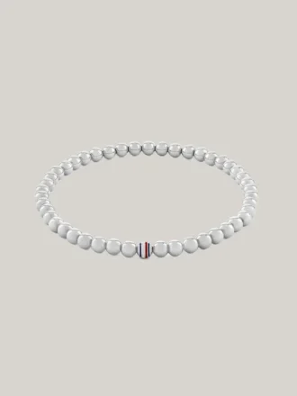 Pulseira com contas metálicas às riscas