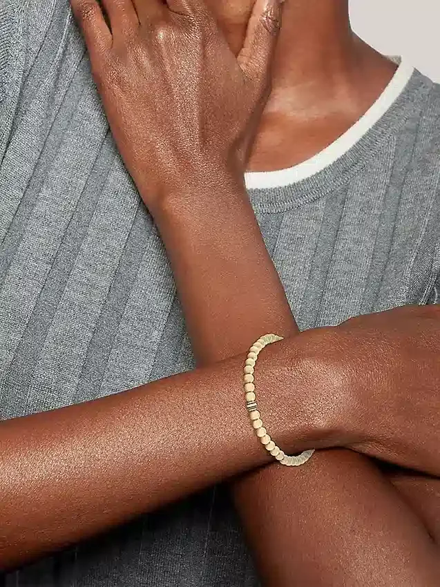 Pulseira com contas metálicas às riscas Pulseira com contas metálicas às riscas