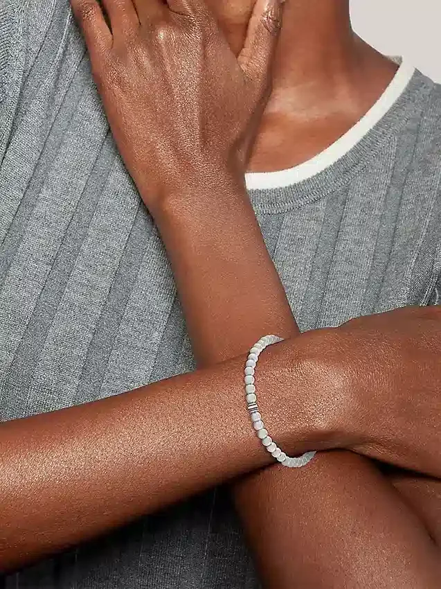 Pulseira com contas metálicas às riscas Pulseira com contas metálicas às riscas