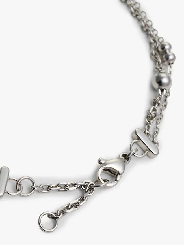 Pulseira de Duas Camadas com Pingente em Forma de Coração Pulseira de Duas Camadas com Pingente em Forma de Coração