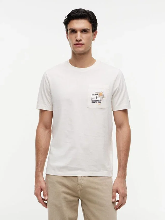 T-shirt com bolso e logótipo floral T-shirt com bolso e logótipo floral
