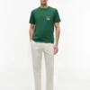 T-shirt com bolso e logótipo floral T-shirt com bolso e logótipo floral