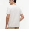 T-shirt com bolso e logótipo floral T-shirt com bolso e logótipo floral