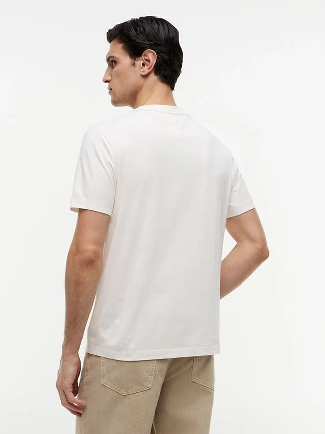T-shirt com bolso e logótipo floral T-shirt com bolso e logótipo floral