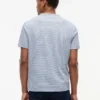 T-shirt com bolso em mistura de linho às riscas T-shirt com bolso em mistura de linho às riscas