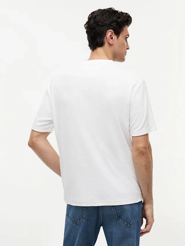 T-shirt com bolso em tecido felpudo T-shirt com bolso em tecido felpudo