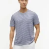 T-shirt com bolso às riscas T-shirt com bolso às riscas