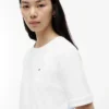 T-shirt com laço nas costas em materiais mistos T-shirt com laço nas costas em materiais mistos