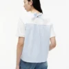 T-shirt com laço nas costas em materiais mistos T-shirt com laço nas costas em materiais mistos