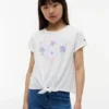 T-shirt infantil com laço à frente e conchas T-shirt infantil com laço à frente e conchas