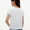 T-shirt infantil com laço à frente e conchas T-shirt infantil com laço à frente e conchas