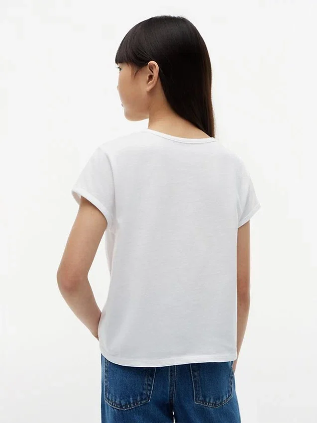 T-shirt infantil com laço à frente e conchas T-shirt infantil com laço à frente e conchas