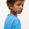 T-shirt infantil com logótipo da bandeira em tons T-shirt infantil com logótipo da bandeira em tons
