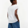 T-shirt infantil com logótipo floral em lantejoulas T-shirt infantil com logótipo floral em lantejoulas