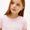 T-shirt infantil com logótipo Hilfiger e gravata à frente T-shirt infantil com logótipo Hilfiger e gravata à frente