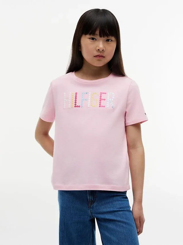T-shirt infantil com logótipo Hilfiger em lantejoulas T-shirt infantil com logótipo Hilfiger em lantejoulas