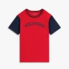T-shirt infantil com logótipo monotipo e blocos de cor T-shirt infantil com logótipo monotipo e blocos de cor