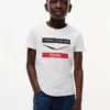T-shirt infantil Tommy x Cadillac F1® Team Chevron T-shirt infantil Tommy x Cadillac F1® Team Chevron