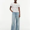 T-shirt às riscas com logótipo bordado T-shirt às riscas com logótipo bordado