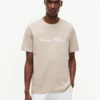 T-shirt às riscas com logótipo náutico T-shirt às riscas com logótipo náutico