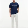 T-shirt às riscas com logótipo náutico T-shirt às riscas com logótipo náutico