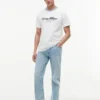 T-shirt às riscas com logótipo náutico T-shirt às riscas com logótipo náutico