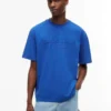 T-shirt Tommy Jeans com logótipo desgastado T-shirt Tommy Jeans com logótipo desgastado