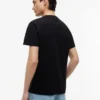 T-shirt Tommy Jeans com logótipo e corte justo T-shirt Tommy Jeans com logótipo e corte justo