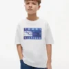 T-shirt Tommy Surf com grafismo para criança T-shirt Tommy Surf com grafismo para criança