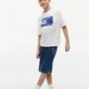 T-shirt Tommy Surf com grafismo para criança T-shirt Tommy Surf com grafismo para criança