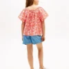 Top infantil com mangas bufantes e estampado tropical Top infantil com mangas bufantes e estampado tropical