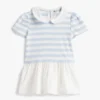 Vestido de bebés às riscas em tecido misto Vestido de bebés às riscas em tecido misto