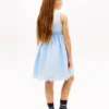 Vestido infantil com bordados e ilhós
