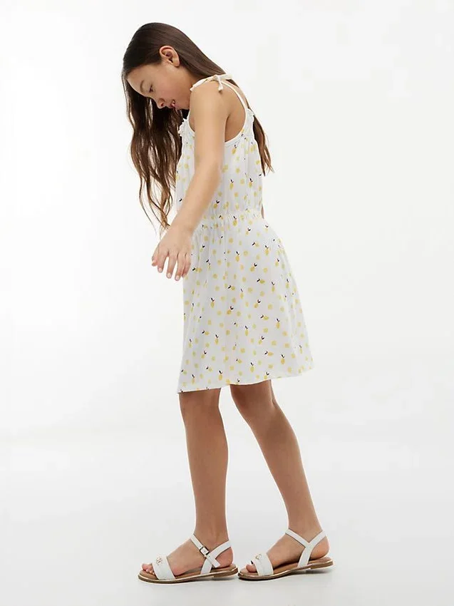 Vestido infantil com estampado de limão e smock Vestido infantil com estampado de limão e smock