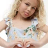 Vestido infantil com folhos e estampado floral Vestido infantil com folhos e estampado floral