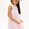 Vestido infantil com laço bordado e ilhós